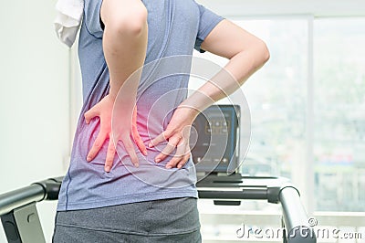 Back pain, close up young man has muscle injury Stock Photo