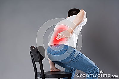 Back pain, kidney inflammation, man suffering from backache Stock Photo