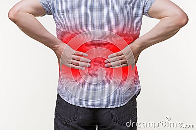 Back pain, kidney inflammation, man suffering from backache Stock Photo
