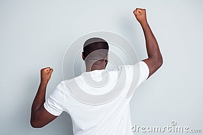 Back rear behind photo of crazy dark skin african guy protester yelling hate police lawlessness raise fists express Stock Photo