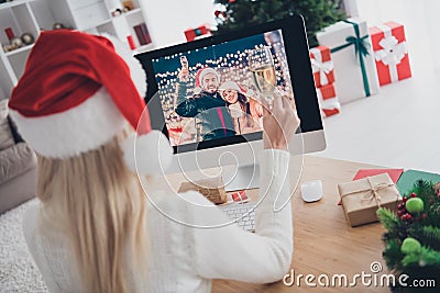 Back rear spine view photo of young woman hold glass champagne talk computer friends virtual indoors inside house home Stock Photo