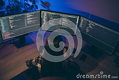 Back rear top above high angle view photo of coder debugging protection software of her corporation removing failures Stock Photo