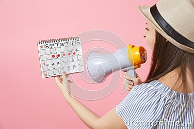 Back rear view angry woman screaming in megaphone, holding periods calendar for checking menstruation days isolated on Stock Photo