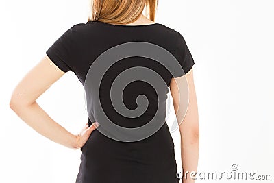 Back rear views black t-shirt Closeup on female body, woman girl in empty black Tshirt isolated on white background, t shirt copy Stock Photo