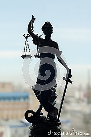 Back of sculpture of themis, femida or justice goddess Stock Photo