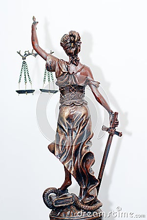 Back of themis, femida or justice goddess sculpture on white Stock Photo