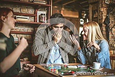 Back to childhood. Play leisure games with friends. Stock Photo