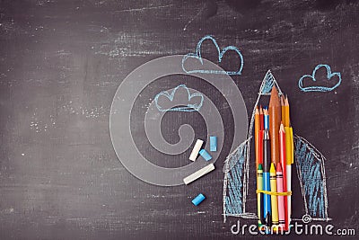 Back to school background with rocket made from pencils. Stock Photo