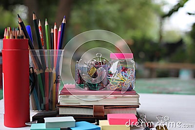 Back to school concept.Books and supplies on white wooden floor Stock Photo