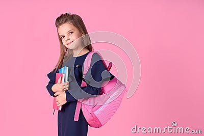 Back to school concept Half turned photo portrait of lovely confident beautiful clever girl with copybook notebook Stock Photo