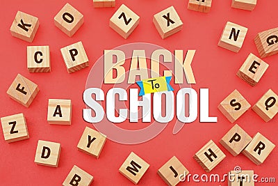 Back to School concept with Wooden alphabets around Stock Photo