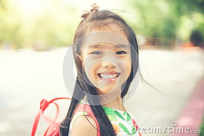 Back to school. Happy smiling girl from elementary school Stock Photo