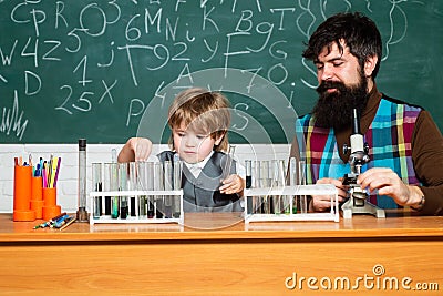 Back to school and happy time Happy smiling pupil and teacher drawing at the desk. Back to school and Education concept Stock Photo