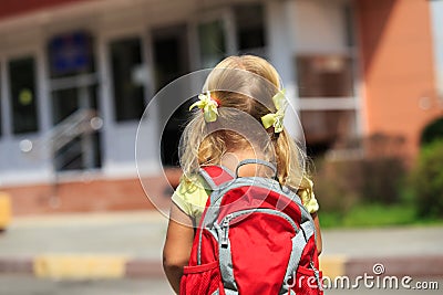 Back to school - little girl near preschool or daycare Stock Photo