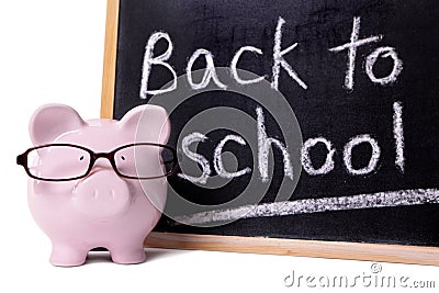 Back to school reminder, piggybank, blackboard, education costs concept Stock Photo