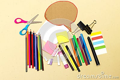 Back to school, school supplies and chat cardboard bubble on a yellow background. Protection of schoolchildren and students from t Stock Photo
