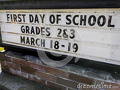 A `Back to School` sign, inviting elementary students to return after the Covid 19 shutdown Editorial Stock Photo