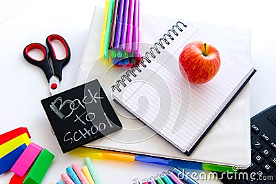 Back to school supplies and an apple for the teacher Stock Photo