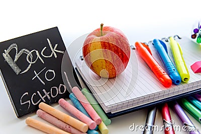 Back to school supplies and an apple for the teacher Stock Photo