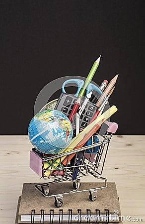 Back to school template with multiple stationery in trolley Stock Photo