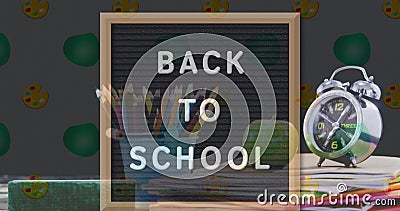 Back to school text on black board against color palette and geometrical instruments icon Stock Photo