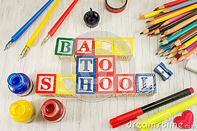 Back to school written with wooden cubicle letters Stock Photo