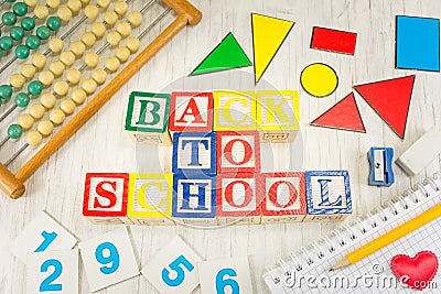 Back to school written with wooden cubicle letters Stock Photo