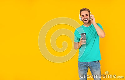 back to school. young guy in headphones drink coffee. music lover. listen to music. Stock Photo