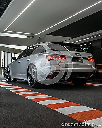 Back view of the beautiful Audi RS6 in matte silver at the parking lot Editorial Stock Photo