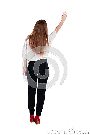 Back view of beautiful business woman welcomes. Stock Photo