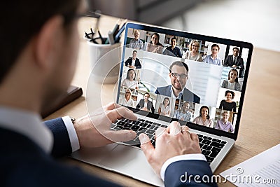 Back view of employee have online web conference with colleagues Stock Photo