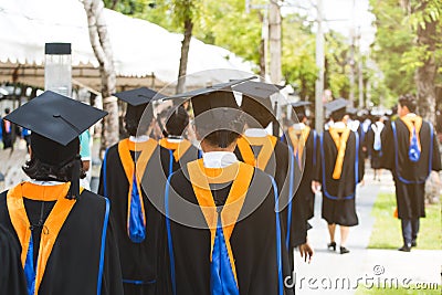 Back view of Graduates during commencement. Concept education congratulation in University. Editorial Stock Photo