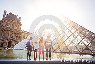 Happy family having fun in Paris on french vacation Editorial Stock Photo