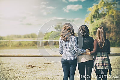 young three ladies standing over beauty nature background Stock Photo