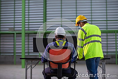 Back View Industrial workers In the construction site Stock Photo