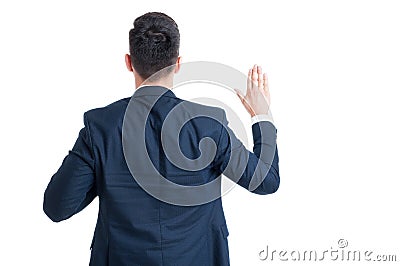 Back view of a lawyer swearing gesture Stock Photo