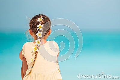 Cute little girl at beach during caribbean vacation Stock Photo