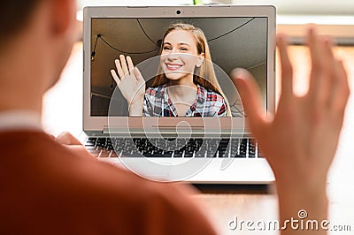 A guy is using laptop for video call, zoom Stock Photo