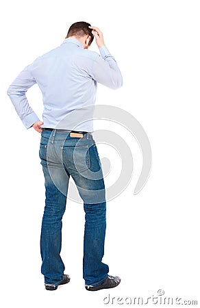 Back view of man . Standing young guy. Stock Photo