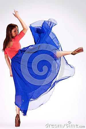 Back view of a modern ballerina kicking Stock Photo