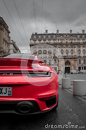 Back view of the red Porsche luxury car Editorial Stock Photo