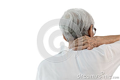 Back view,Senior woman suffering from neck pain,disease of cervical spondylosis,old elderly touching nape or scruff,muscle tension Stock Photo