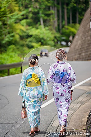 Back view of woman wearing Japanese yukata summer kimono Editorial Stock Photo