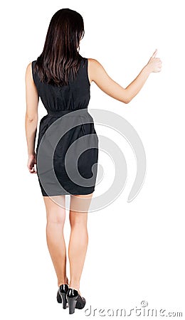 Back view of woman thumbs up. Stock Photo
