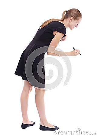 Back view of writing beautiful woman. Young girl in dress. Stock Photo