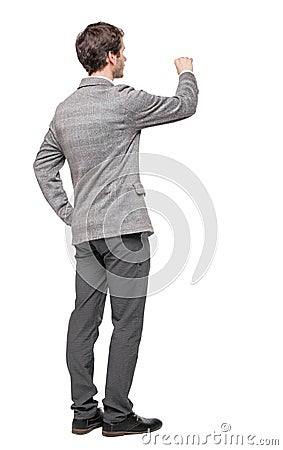 Back view of writing business man in suit Stock Photo