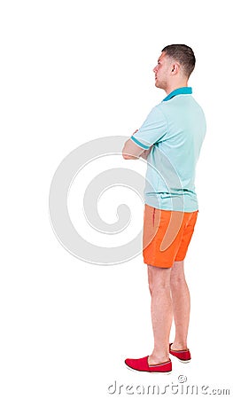 Back view of young manin shorts looking. Stock Photo