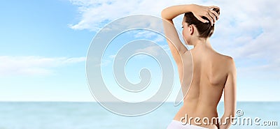 Back of woman on summer sky and sea Stock Photo