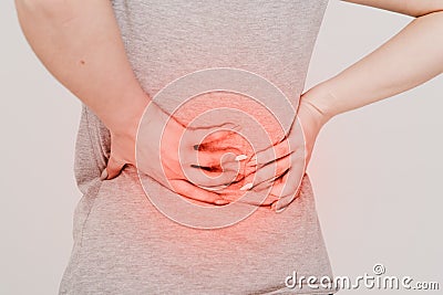 Backache. Kidney problems concept. Lumbago. Stock Photo