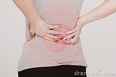 Backache. Kidney problems concept. Lumbago. Stock Photo